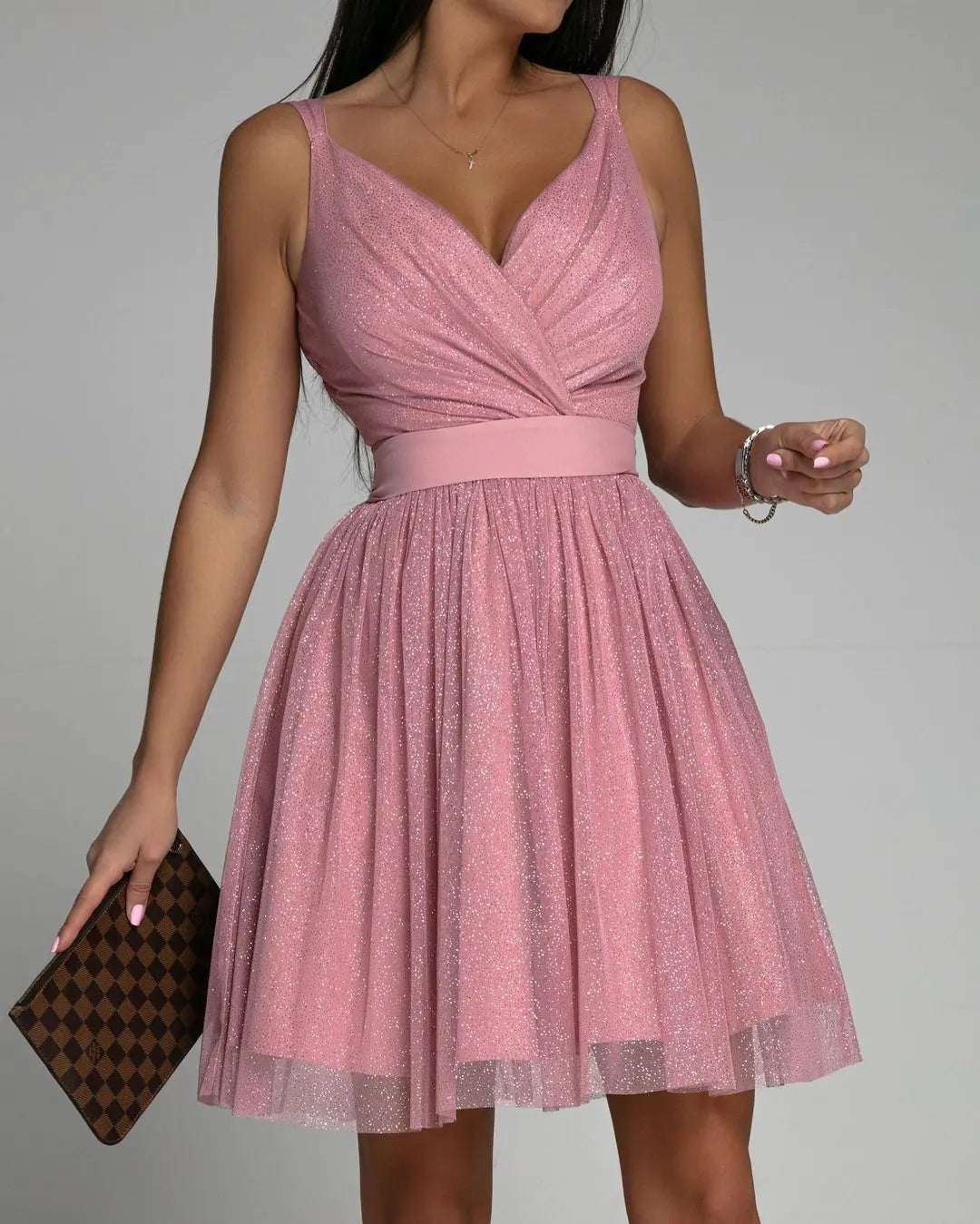 Elegant Glitter Sleeveless Deep V Neck Party Dress for Women in pink with a fitted bodice and flared skirt.